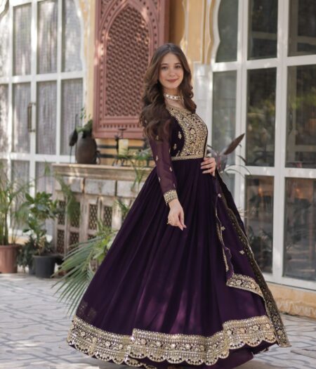 Women's Luxurious Plum Velvet Anarkali Gown with Heavy Gold Zari & Sequin Embroidery – Perfect for Weddings & Grand Festivities
