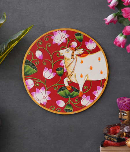 Pichwai Painting: White Cow with Lotus Flowers in a Circle on a Red Background